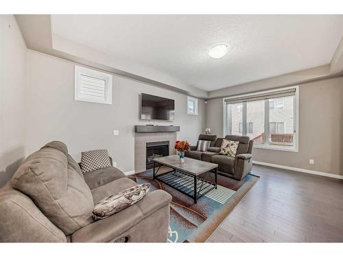 170 Cityscape Way Ne, Calgary, AB - Indoor Photo Showing Living Room With Fireplace