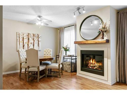 2-2211 28 Street Sw, Calgary, AB - Indoor With Fireplace