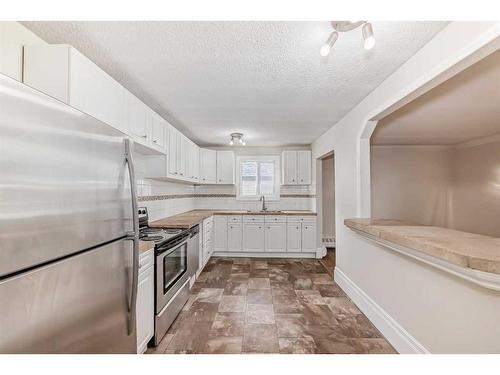 401-1817 11 Avenue Sw, Calgary, AB - Indoor Photo Showing Kitchen With Stainless Steel Kitchen With Upgraded Kitchen