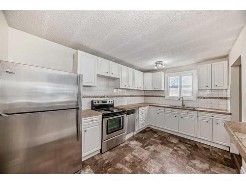 401-1817 11 Avenue Sw, Calgary, AB - Indoor Photo Showing Kitchen With Stainless Steel Kitchen With Upgraded Kitchen