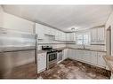 401-1817 11 Avenue Sw, Calgary, AB  - Indoor Photo Showing Kitchen With Stainless Steel Kitchen With Upgraded Kitchen 