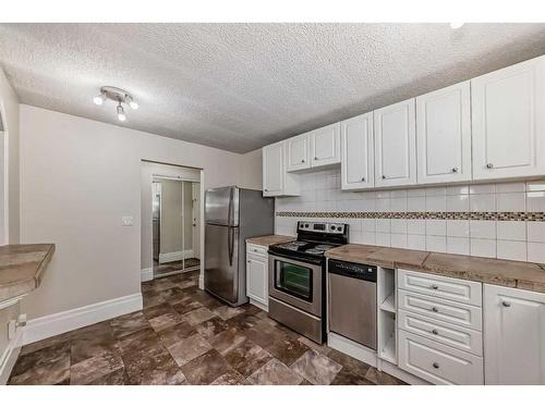 401-1817 11 Avenue Sw, Calgary, AB - Indoor Photo Showing Kitchen With Stainless Steel Kitchen