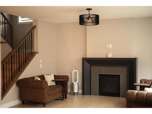 331 Legacy Circle Se, Calgary, AB - Indoor Photo Showing Living Room With Fireplace