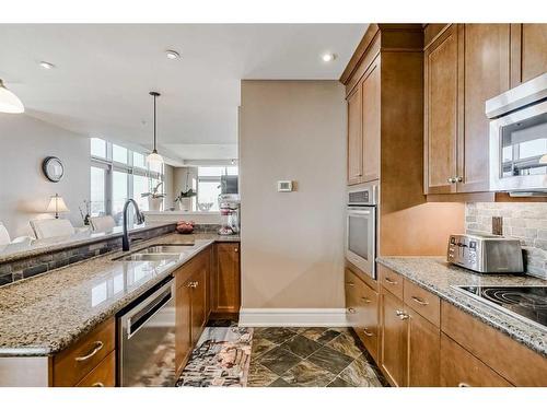 2802-910 5 Avenue Sw, Calgary, AB - Indoor Photo Showing Kitchen With Double Sink