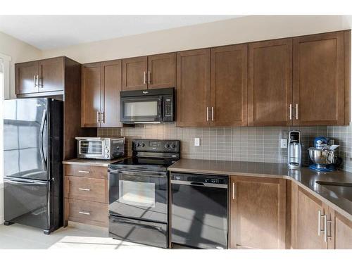 12 Nolan Hill Gate Nw, Calgary, AB - Indoor Photo Showing Kitchen