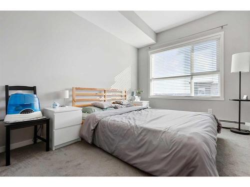 418-4150 Seton Drive Se, Calgary, AB - Indoor Photo Showing Bedroom