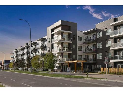 418-4150 Seton Drive Se, Calgary, AB - Outdoor With Balcony With Facade