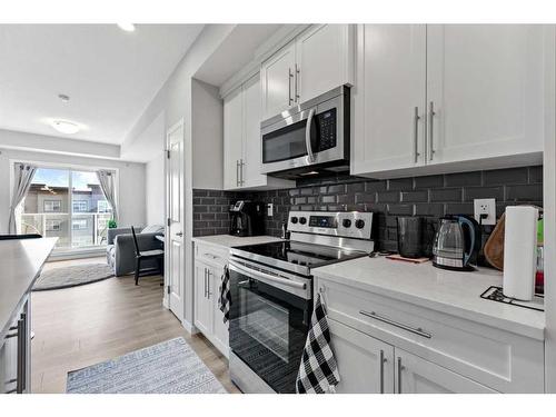 418-4150 Seton Drive Se, Calgary, AB - Indoor Photo Showing Kitchen