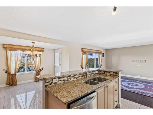 84 Taracove Crescent Ne, Calgary, AB - Indoor Photo Showing Kitchen With Double Sink