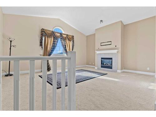 84 Taracove Crescent Ne, Calgary, AB - Indoor With Fireplace