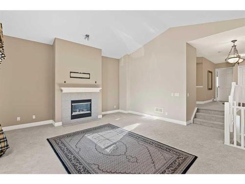 84 Taracove Crescent Ne, Calgary, AB - Indoor With Fireplace