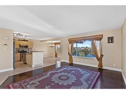 84 Taracove Crescent Ne, Calgary, AB - Indoor Photo Showing Living Room