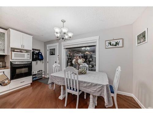 25 Cimarron Crescent, Okotoks, AB - Indoor Photo Showing Dining Room