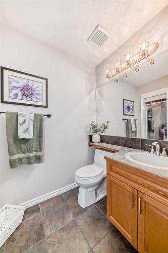 25 Cimarron Crescent, Okotoks, AB - Indoor Photo Showing Bathroom