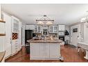 25 Cimarron Crescent, Okotoks, AB  - Indoor Photo Showing Kitchen With Upgraded Kitchen 