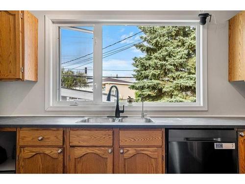 2308 Munro Drive Ne, Calgary, AB - Indoor Photo Showing Kitchen With Double Sink