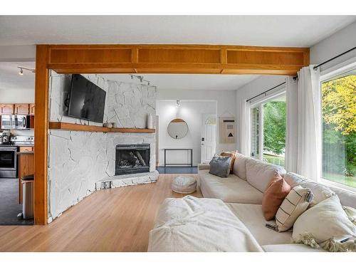 2308 Munro Drive Ne, Calgary, AB - Indoor Photo Showing Living Room With Fireplace