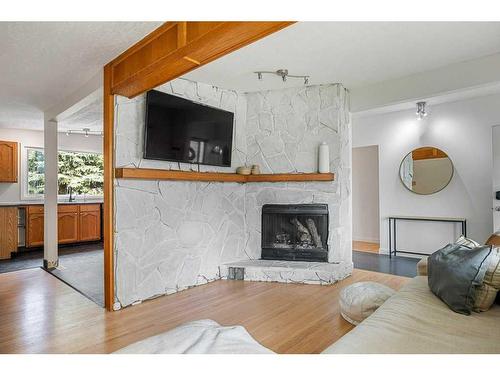 2308 Munro Drive Ne, Calgary, AB - Indoor Photo Showing Living Room With Fireplace