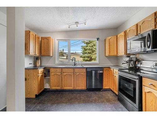 2308 Munro Drive Ne, Calgary, AB - Indoor Photo Showing Kitchen