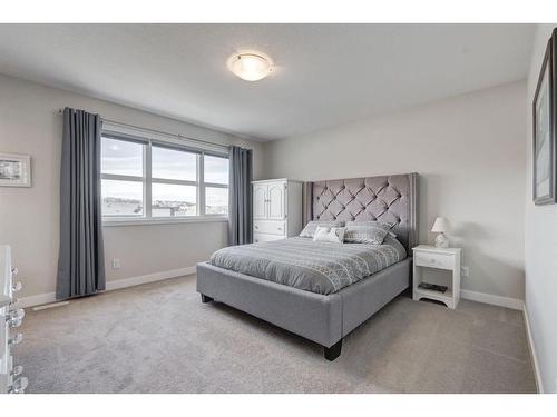 218 Riviera View, Cochrane, AB - Indoor Photo Showing Bedroom