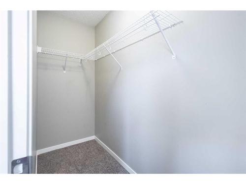 144 New Brighton Point Se, Calgary, AB - Indoor With Storage