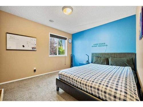 38 Everwillow Boulevard Sw, Calgary, AB - Indoor Photo Showing Bedroom