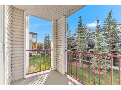 207-9 Country Village Bay Ne, Calgary, AB - Outdoor With Balcony With Exterior