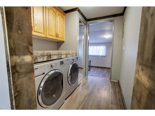 380 59 Avenue, Claresholm, AB - Indoor Photo Showing Laundry Room