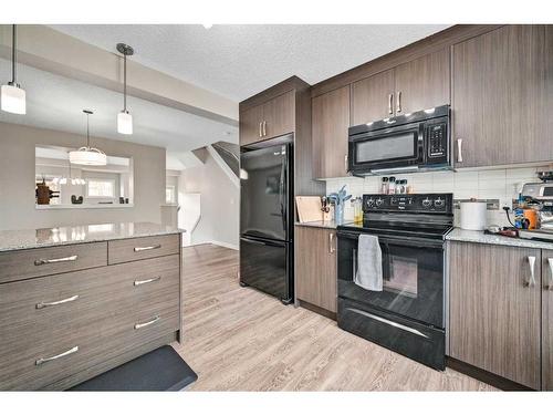 407 Auburn Bay Circle Se, Calgary, AB - Indoor Photo Showing Kitchen