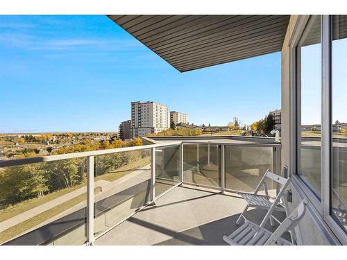 401-30 Shawnee Common Sw, Calgary, AB - Outdoor With Balcony With View With Exterior