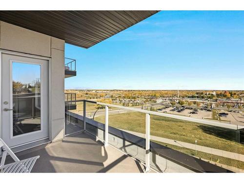 401-30 Shawnee Common Sw, Calgary, AB - Outdoor With Balcony With View With Exterior