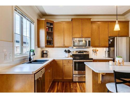 3-2326 2 Avenue Nw, Calgary, AB - Indoor Photo Showing Kitchen With Stainless Steel Kitchen With Double Sink