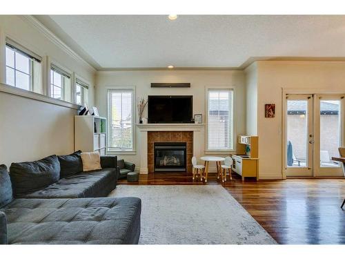 3-2326 2 Avenue Nw, Calgary, AB - Indoor Photo Showing Living Room With Fireplace