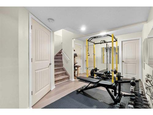 1425 Ranch Road, Carstairs, AB - Indoor Photo Showing Gym Room