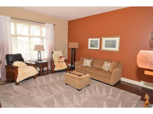 61 Big Hill Springs Estates, Rural Rocky View County, AB - Indoor Photo Showing Living Room