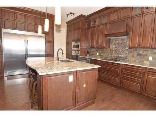 61 Big Hill Springs Estates, Rural Rocky View County, AB - Indoor Photo Showing Kitchen With Upgraded Kitchen