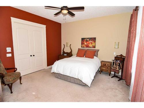 61 Big Hill Springs Estates, Rural Rocky View County, AB - Indoor Photo Showing Bedroom