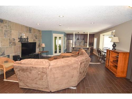 61 Big Hill Springs Estates, Rural Rocky View County, AB - Indoor Photo Showing Living Room