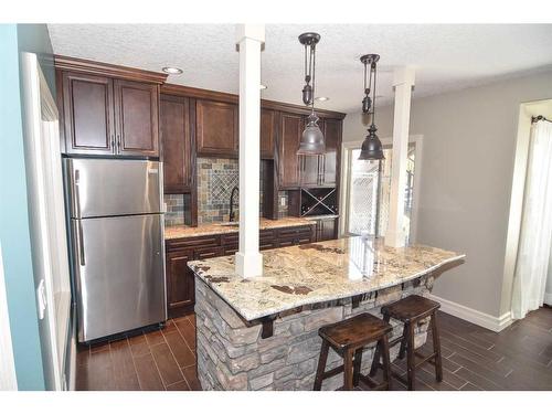 61 Big Hill Springs Estates, Rural Rocky View County, AB - Indoor Photo Showing Kitchen With Upgraded Kitchen