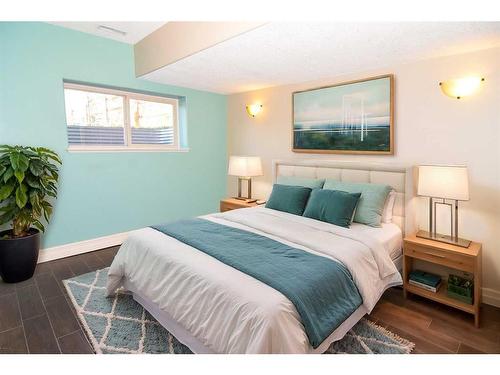 61 Big Hill Springs Estates, Rural Rocky View County, AB - Indoor Photo Showing Bedroom