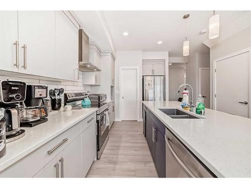 129 Legacy Glen Circle Se, Calgary, AB - Indoor Photo Showing Kitchen With Double Sink With Upgraded Kitchen