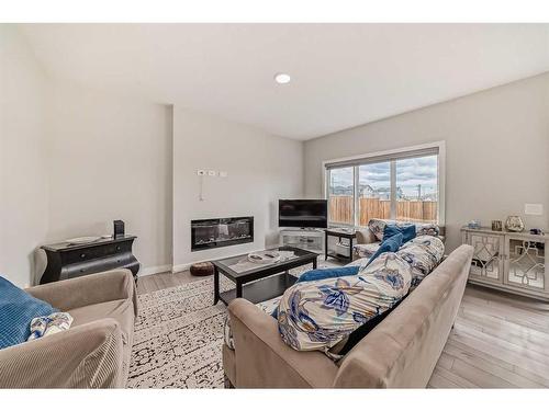 129 Legacy Glen Circle Se, Calgary, AB - Indoor Photo Showing Living Room With Fireplace