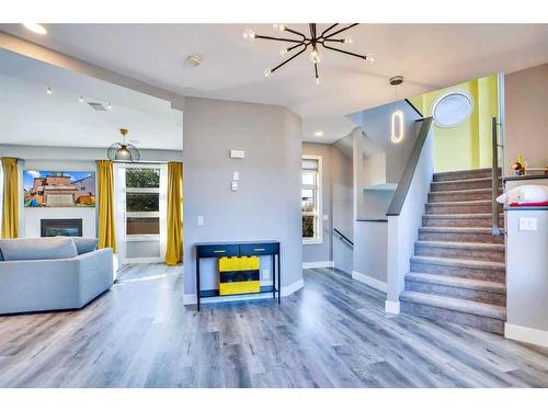 4735 17 Avenue Nw, Calgary, AB - Indoor Photo Showing Living Room With Fireplace