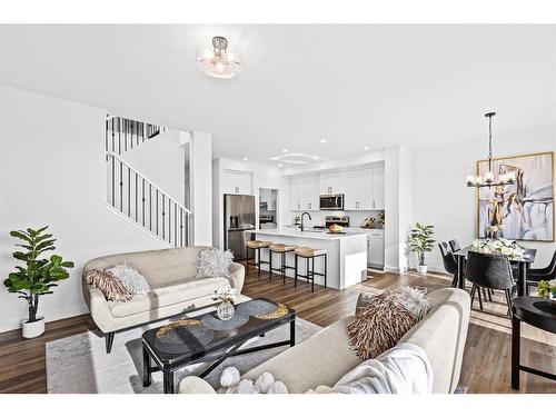 935 Langholm Drive Se, Airdrie, AB - Indoor Photo Showing Living Room