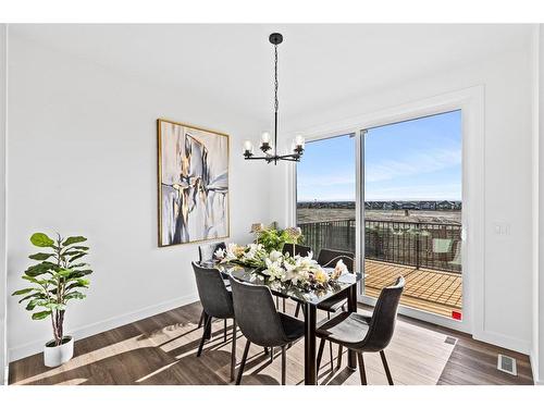 935 Langholm Drive Se, Airdrie, AB - Indoor Photo Showing Dining Room