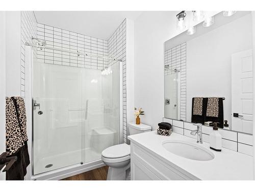 935 Langholm Drive Se, Airdrie, AB - Indoor Photo Showing Bathroom