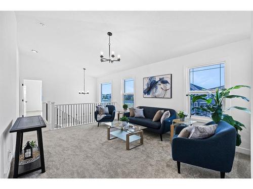 935 Langholm Drive Se, Airdrie, AB - Indoor Photo Showing Living Room