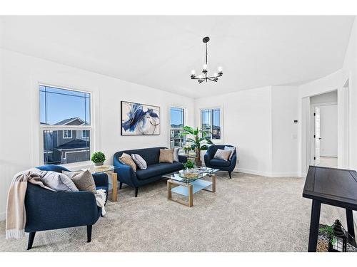 935 Langholm Drive Se, Airdrie, AB - Indoor Photo Showing Living Room