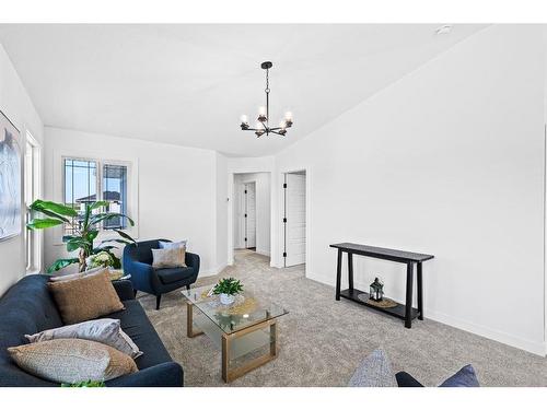 935 Langholm Drive Se, Airdrie, AB - Indoor Photo Showing Living Room