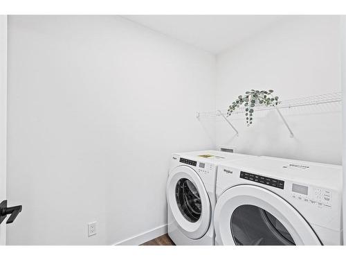 935 Langholm Drive Se, Airdrie, AB - Indoor Photo Showing Laundry Room